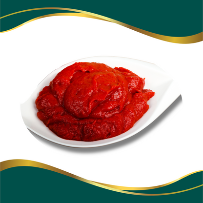 scoop of red tin tomato paste