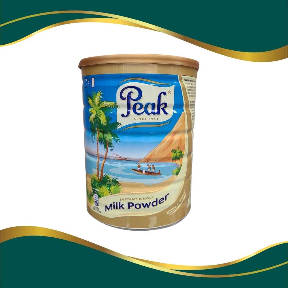 Peak Milk since 1954 Instant whole powder milk  900g tropical palm fronds photo on container with canoe